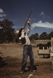 Mr. Leatherman, homesteader, shooting hawks..., Pie Town, New Mexico, 1940. Creator: Russell Lee.