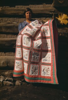 Mrs. Bill Stagg with state quilt which she made, Pie Town, New Mexico, 1940. Creator: Russell Lee.