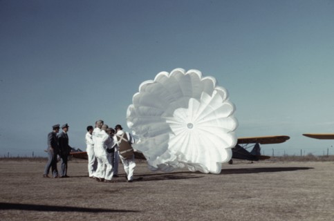 Instructor explaining the operation of a parachute to student pilots, Fort Worth, Tex., 1942. Creator: Arthur Rothstein.