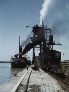 Loading a lake freighter with coal at the Pennsylvania R.R. coal docks...Sandusky, Ohio, 1943. Creator: Jack Delano.