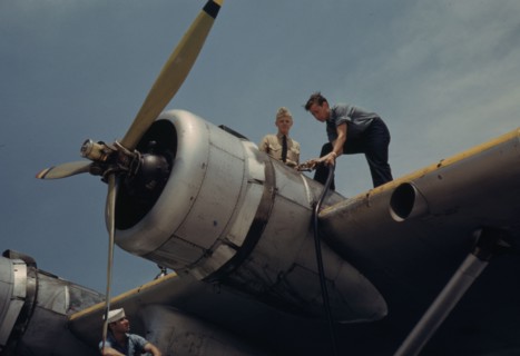 Fueling a plane at the Naval Air Base, Corpus Christi, Texas, 1942. Creator: Howard Hollem.