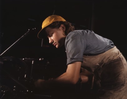 A lathe operator machining parts for...Consolidated Aircraft Corp. plant, Fort Worth, Texas, 1942. Creator: Howard Hollem.
