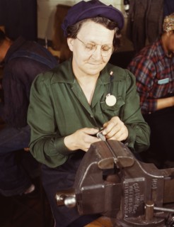 War production worker at the Vilter [Manufacturing] Company making M5...Milwaukee, Wis. , 1943. Creator: Howard Hollem.