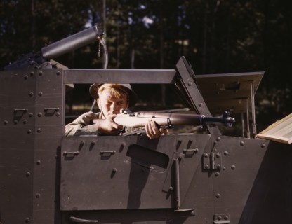 Halftrack infantryman with Garand rifle, Ft. Knox, Ky., 1942. Creator: Alfred T Palmer.