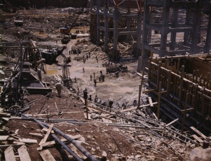 Excavating within the log cofferdam during an early stage of construction, Douglas Dam, Tenn., 1942. Creator: Alfred T Palmer.