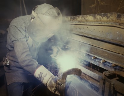 Welder making boilers for a ship, Combustion Engineering Co., Chattanooga, Tenn., 1942. Creator: Alfred T Palmer.