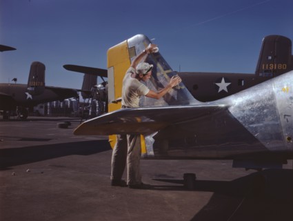 On North American's outdoor assembly line..., North American Aviation, Inc., Inglewood, Calif., 1942 Creator: Alfred T Palmer.