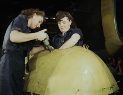 Working on a "Vengeance" dive bomber, Vultee [Aircraft Inc.], Nashville, Tennessee, 1943. Creator: Alfred T Palmer.