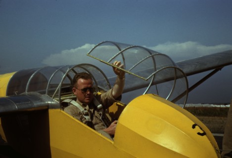Marine glider pilot in training at Page Field, is watching take-offs, Parris Island, S.C., 1942. Creator: Alfred T Palmer.