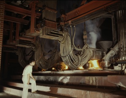 A large electric phosphate smelting furnace used in the making...Muscle Shoals area, Alabama, 1942. Creator: Alfred T Palmer.