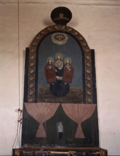 An altar in the church dedicated to the Trinity, Trampas, N.M., 1943. Creator: John Collier.