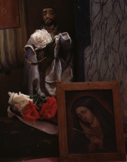 A Santo bulto and a painting of the Dolorosa in the church, Trampas, New Mexico, 1943. Creator: John Collier.