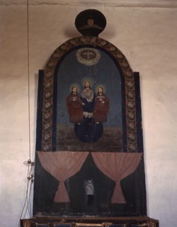 An altar in the church dedicated to the Trinity, Trampas, N.M., 1943. Creator: John Collier.