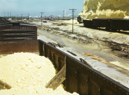 Railroad cars loaded with sulphur, Freeport Sulphur Co., Hoskins Mound, Texas, 1943. Creator: John Vachon.