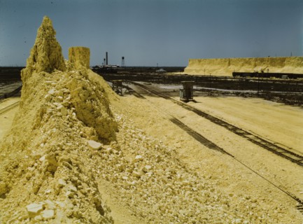 Nearly exhausted sulphur vat from which railroad..., Freeport Sulphur Co, Hoskins Mound, Texas, 1943 Creator: John Vachon.
