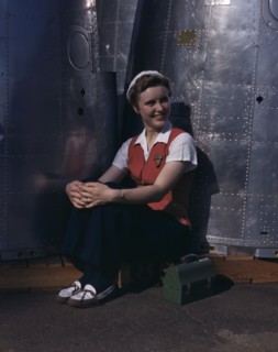A noontime rest for a full-fledged...Long Beach, Calif., plant of Douglas Aircraft Company, 1942. Creator: Alfred T Palmer.