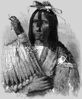 'Hashquaht Chief, in War Dress; In pawn in an Indian village', 1875.  Creator: Unknown.