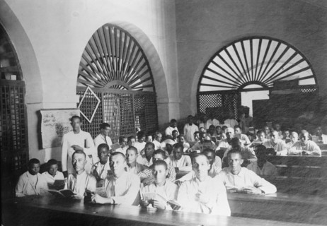 Puerto Rico Schools, 1912. [Men in a classroom].