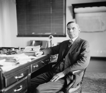 S.G. Hopkins, between 1910 and 1920. Man at writing desk.