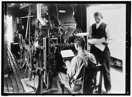 G.N. Press Car, between 1913 and 1918. Men in printing works.
