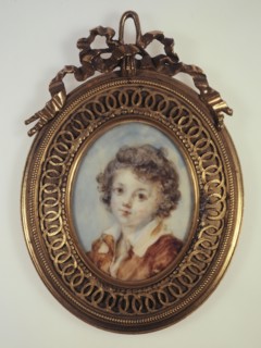 Portrait en buste d'un jeune garçon.