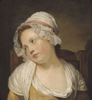 Portrait of a little girl in a white cap.