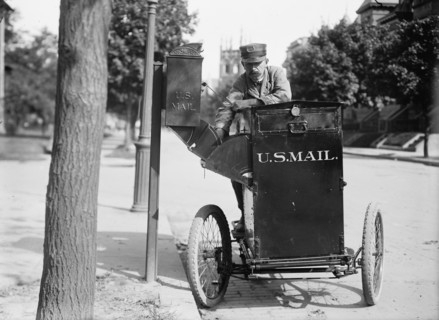 Post office Department - Motor Cycle Postman, 1912. [USA].