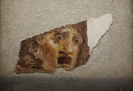 Fragment with tragic theatrical mask, 1st century. Creator: Roman-Pompeian wall painting.