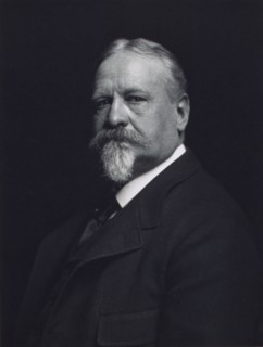 Man with mustache and goatee, facing left, half-length portrait, c1900.