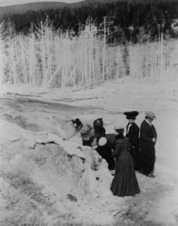 A group of tourists explore land formations in Yellowstone National Park, 1903.