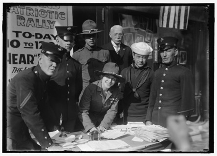 Dora Rodrigues, recruiter for service branches, possibly in front of the Cosmos Theater..., May 1917 Creator: Harris & Ewing.
