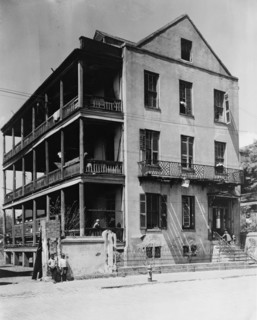 Front and side view of apartment(?) house, 61 Washington Street, Charleston, South Carolina, between 1933 and 1940.