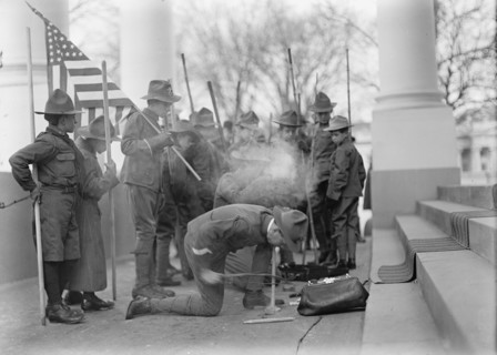 Boy Scouts - Visit of Sir Robert Baden-Powell To D.C. Making Fire, 1911. Creator: Harris & Ewing.