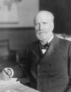 James Wilson, half-length portrait, seated at desk, facing slightly left, c1906. Creator: Frances Benjamin Johnston.