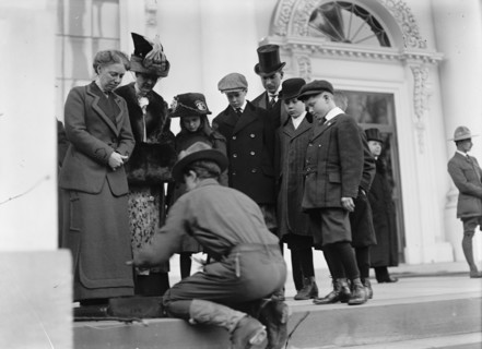 Boy Scouts - Visit of Sir Robert Baden-Powell To D.C. Making Fire; Mrs. Taft Watching, 1911. Creator: Harris & Ewing.