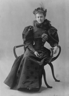Mrs. Elizabeth Cameron, full-length portrait, seated, facing front, between c1890 and c1910. Creator: Frances Benjamin Johnston.