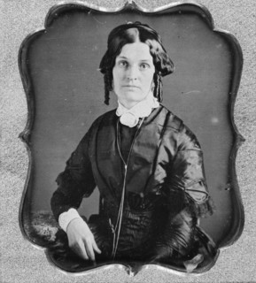 Joannette Clark Benjamin, three-quarter length portrait of a woman, facing front, seated, c1840-1860 Creator: Unknown.