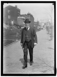 Charles Evans Hughes walking away from Union Station, Washington, D.C..., between 1913 and 1917. Creator: Harris & Ewing.