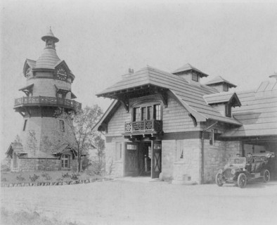 Windmill-shaped clock tower at left, and part of garage of Edmund..., Greenwich, Connecticut, 1908. Creator: Frances Benjamin Johnston.