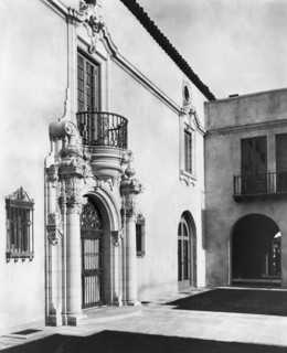 Pasadena, California, Mrs. Herbert Coppell home - detail of ornate doorway and balcony above, 1917. Creator: Frances Benjamin Johnston.