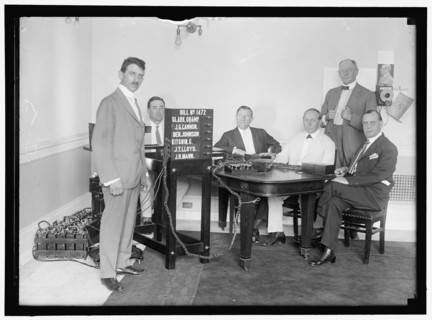 Bobroff voting machine being considered for use in house, between 1910 and 1917. Creator: Harris & Ewing.