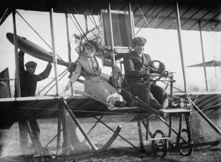 Senorita Lenore Riviero [sic] with Anthony Jannus; In Rex Smith Aeroplane, 1912. Creator: Harris & Ewing.