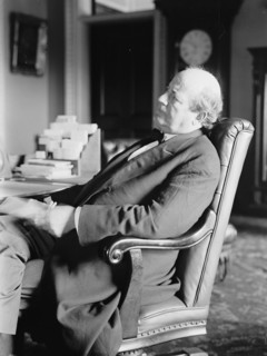 William Jennings Bryan, Rep. from Nebraska, at desk, 1914. Creator: Harris & Ewing.