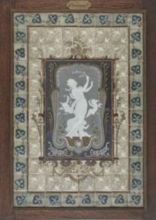 Plaque showing a woman and three cherubs, late 19th-early 20th century. Creator: Albert Louis Dammouse.
