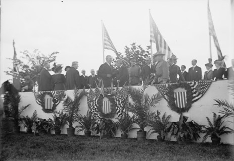 Cavalry Review By President Wilson - Seen In Stand: President Wilson; General Wood; Col..., 1913. Creator: Harris & Ewing.