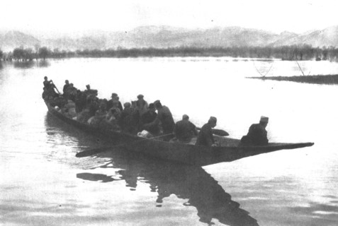 ''Les Serbes a Scutari d'Albanie; deputes de la Skoupchtina traversant le lac de Scutari.', 1916. Creator: Samson Tchernoff.