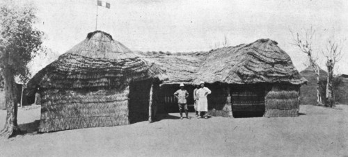 'La grande guerre en Afrique; le drapeau francais flotte sur la case du lieutenant..., c1916. Creator: Unknown.
