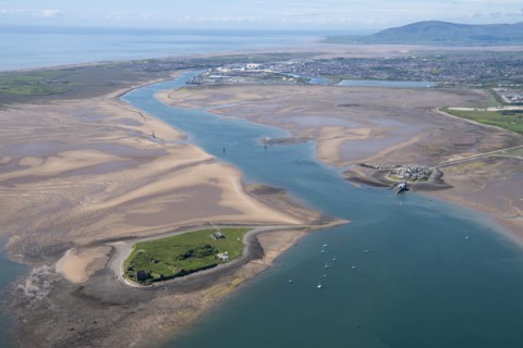 Piel and Roa Islands with Barrow-in-Furness and Black Combe fell in the background, Cumbria, 2021.