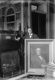 Daniels, Josephus, Secretary of The Navy, 1913-1921 with Painting of Secretary of The Navy George E. Badger, 1913.