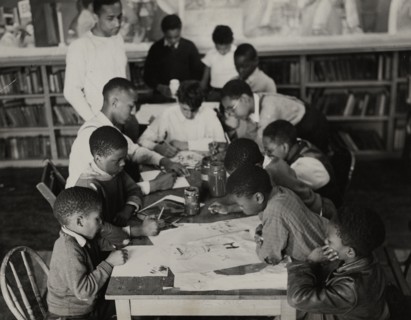 Oliver Harrington supervises class studying mural work, Hudson Ave Boys' Club, 1936.